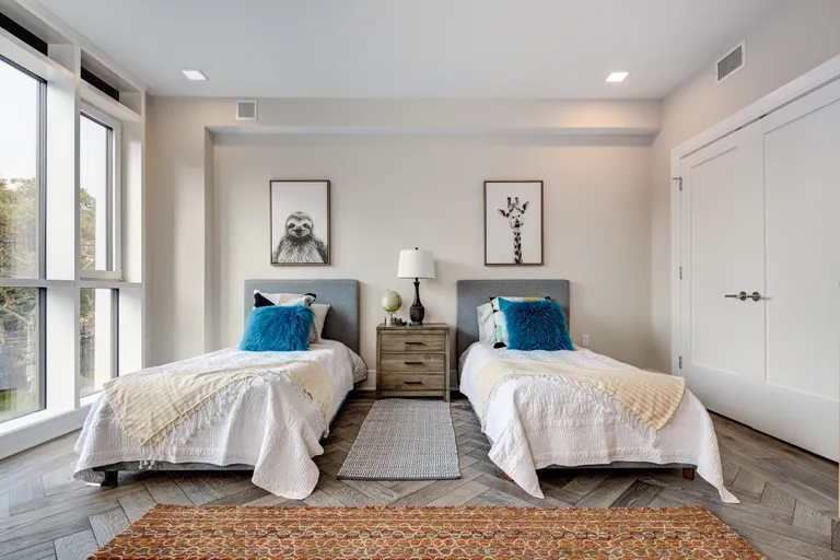 twin beds in neutral room