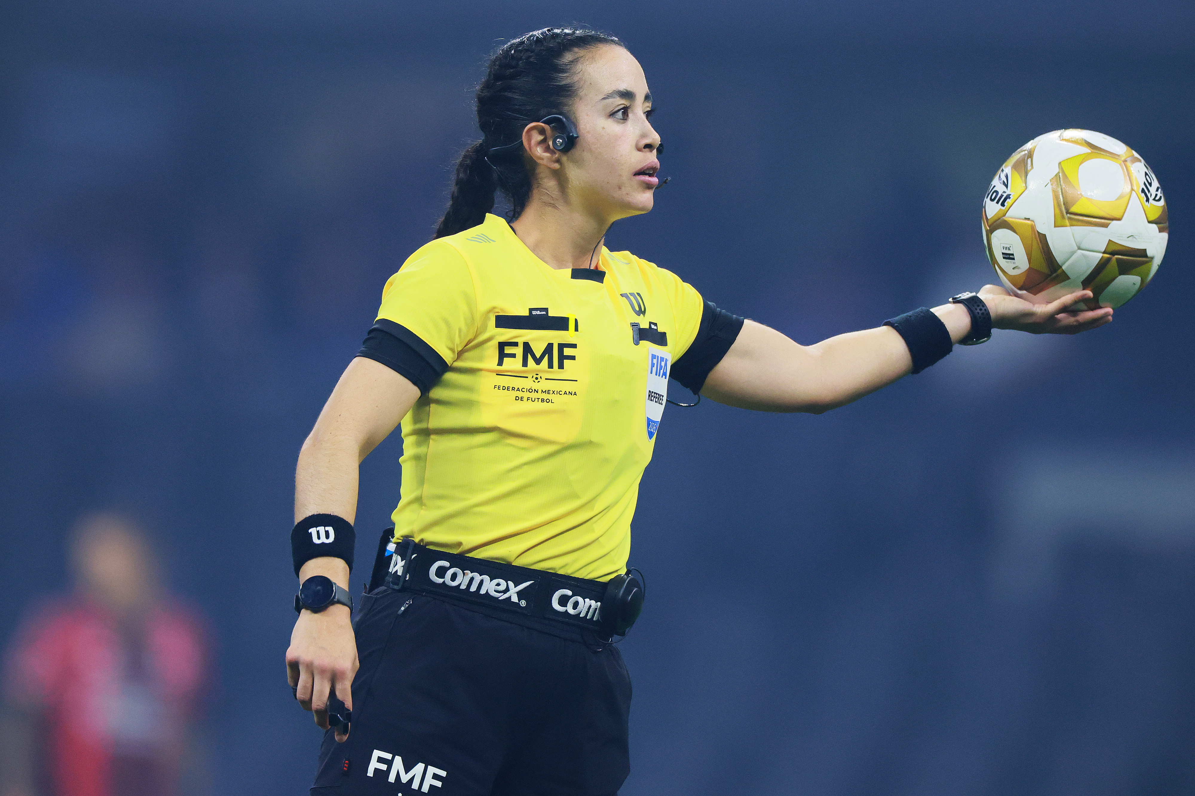 MEXICO CITY, MEXICO - MAY 09: Referee Katia Itzel Garcia holds the ball during the quarterfinals second leg match between Cruz Azul and Atlas as part of the Torneo Clausura 2026 Liga MX