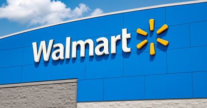 The Walmart logo on the front of a Walmart store