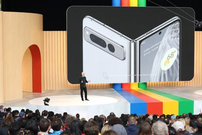 A picture of a speaker on stage at Google's developer conference