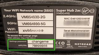 Screenshot showing the bottom of a router with the default password and pin highlighted.
