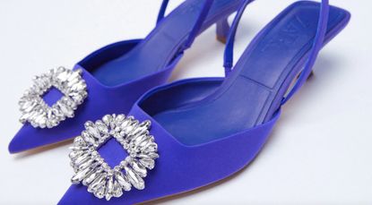 Zara's blue shoes with jeweled buckle