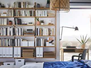 Ikea shelves used to create a bookshelf wall