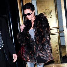 An image of Victoria Beckham showcasing 2010s fashion trends.