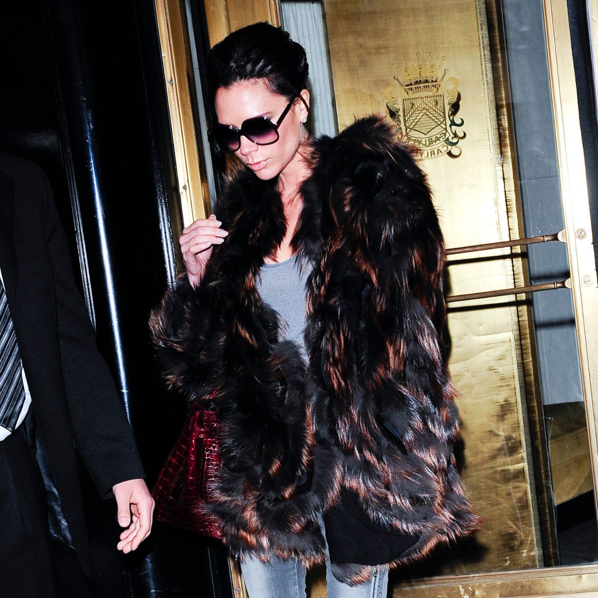 An image of Victoria Beckham showcasing 2010s fashion trends. 