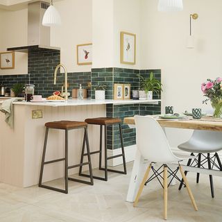 kitchen-diner with peninsula and bar stools