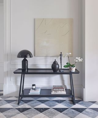 Marble floor in entryway with console table
