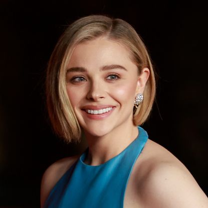 a woman with short blond hair