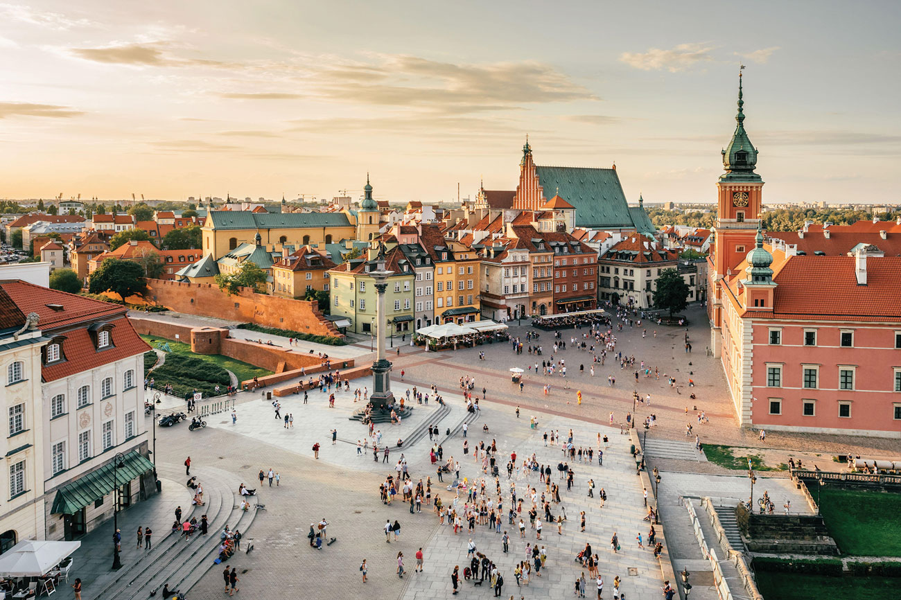 Tourist crowds in Castle Square, central Warsaw