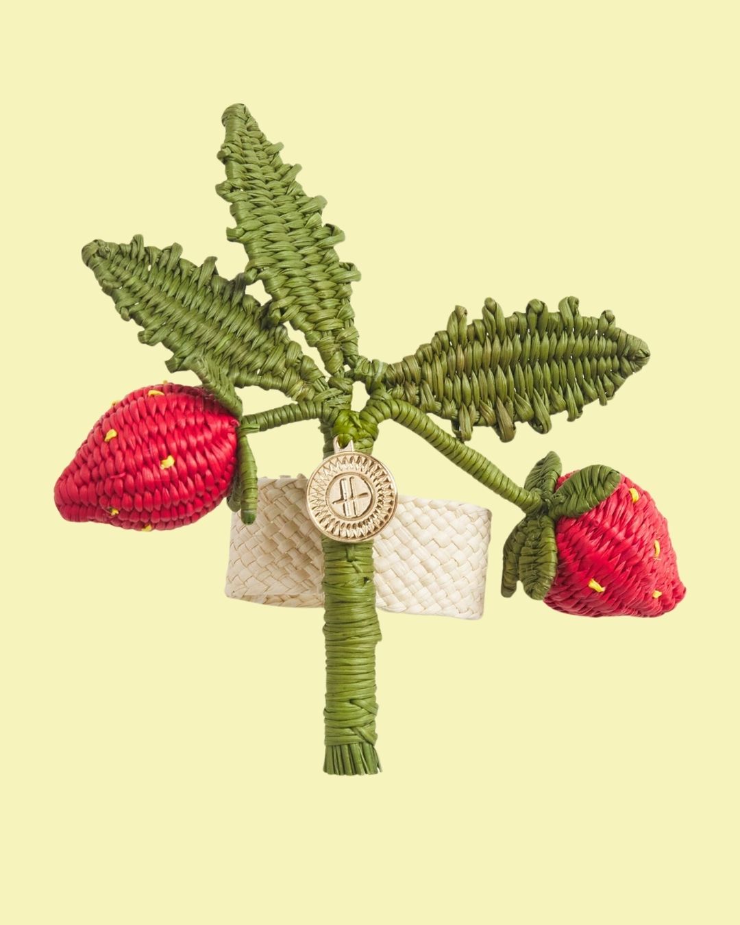 A series of sculptural rattan decorative items, including place mats, cake stands, laundry baskets, lights, napkin rings, and storage units.