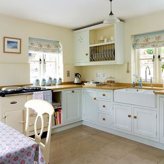 kitchen with cabinets and wooden worktop