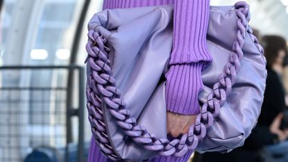  A model, vegan leather bag detail, walks the runway during the Stella McCartney Womenswear Fall/Winter 2022-2023 show as part of Paris Fashion Week at Centre Pompidou on March 07, 2022 in Paris, France