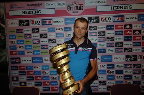 Michele Scarponi was awarded the trophy for the 2011 Giro d'Italia following the disqualification of Alberto Contador's results