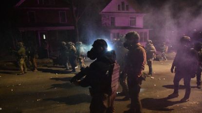 Federal immigration officers try to disperse crowd after Jan. 14 ICE shooting of Venezuelan migrant in Minneapolis