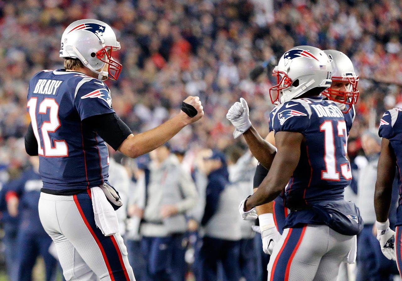 Tom Brady and Phillip Dorsett celebrate