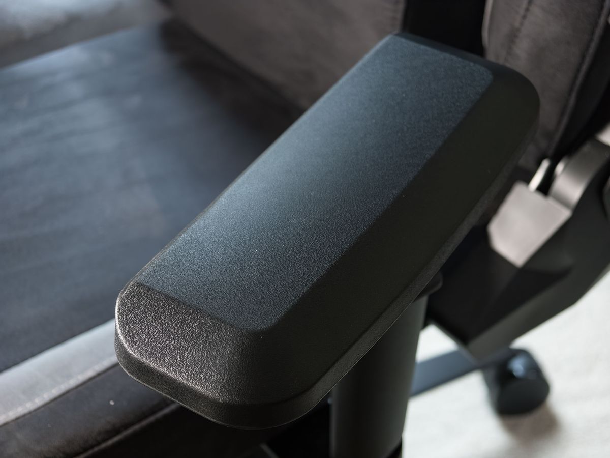 Closeup of the Arozzi Vernazza Supersoft gaming chair's arm rest turned outwards
