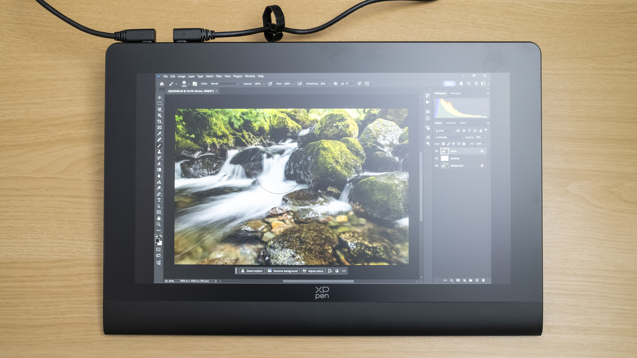 XPPen Artist Ultra 16 showing a waterfall photo in Photoshop