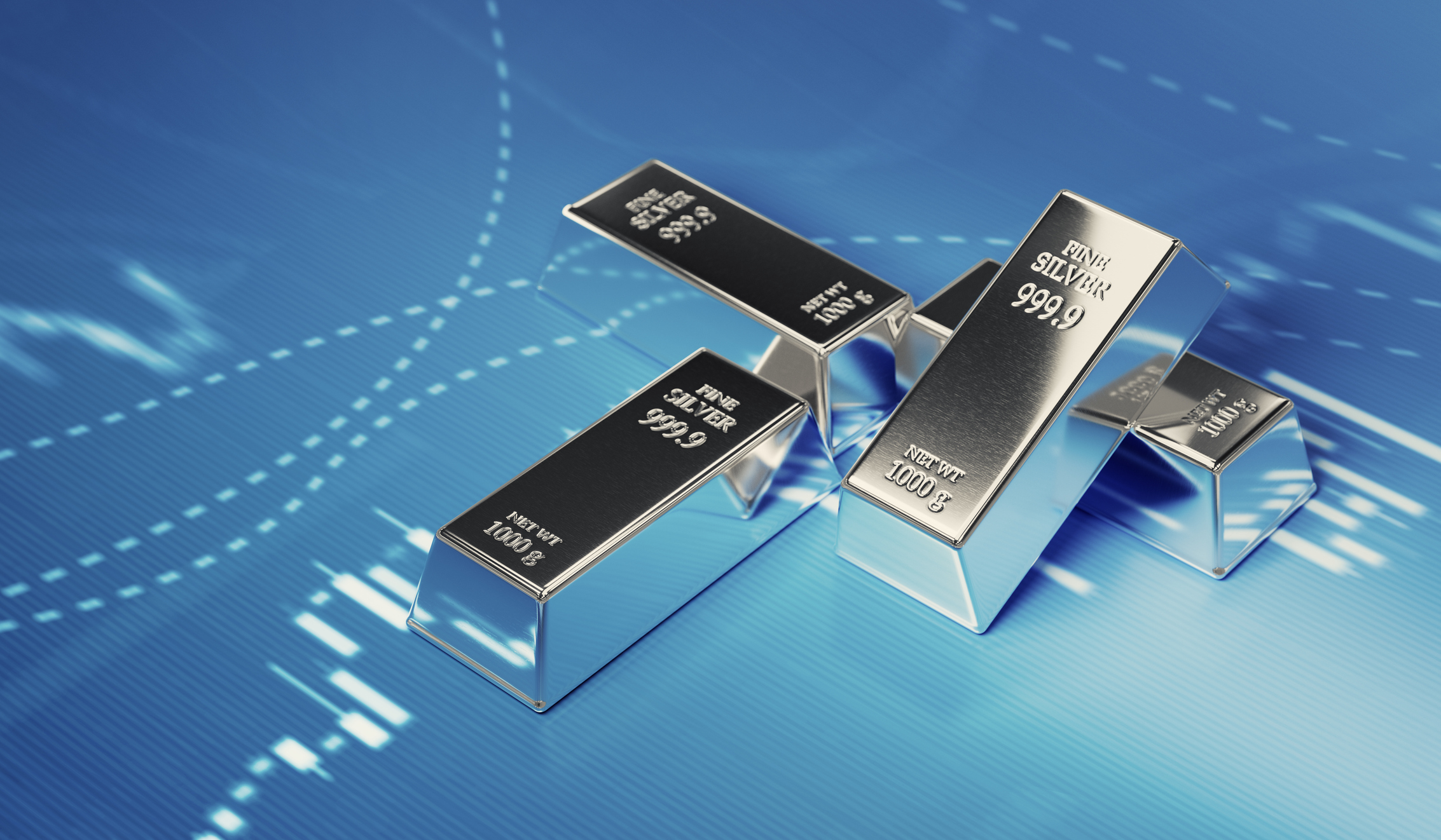 Silver bars sitting in front of bar graph