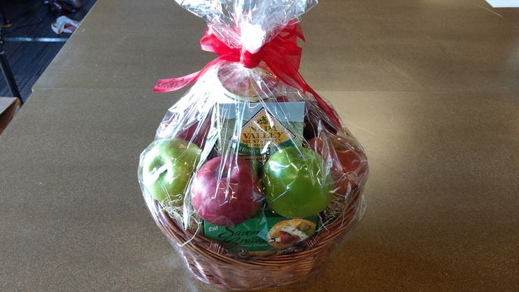 While other baskets were sealed with plastic wrap, the FTD basket was tied at the top making it easier to open.