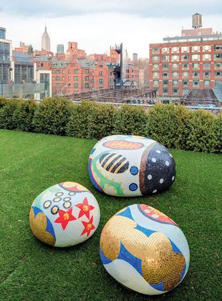 Marcel Wanders-designed ottomans/coffee tables in the store’s rooftop garden.