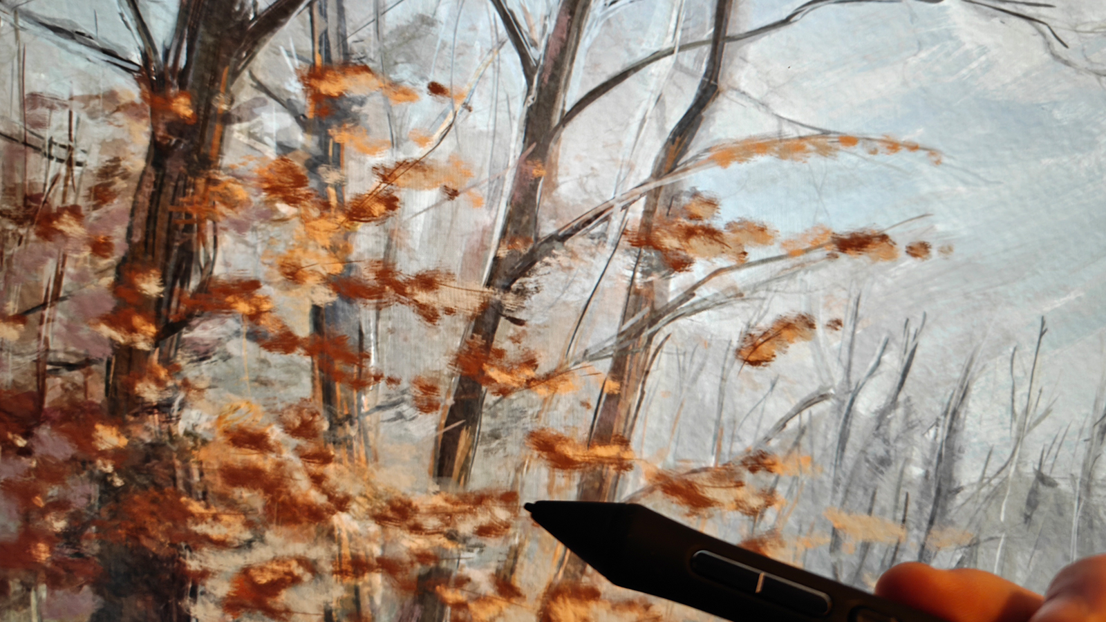 A black drawing tablet on a desk