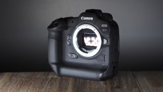Canon EOS R3 on a wooden surface