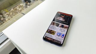 Oppo Find X5 Lite review: phone on a desk by a window