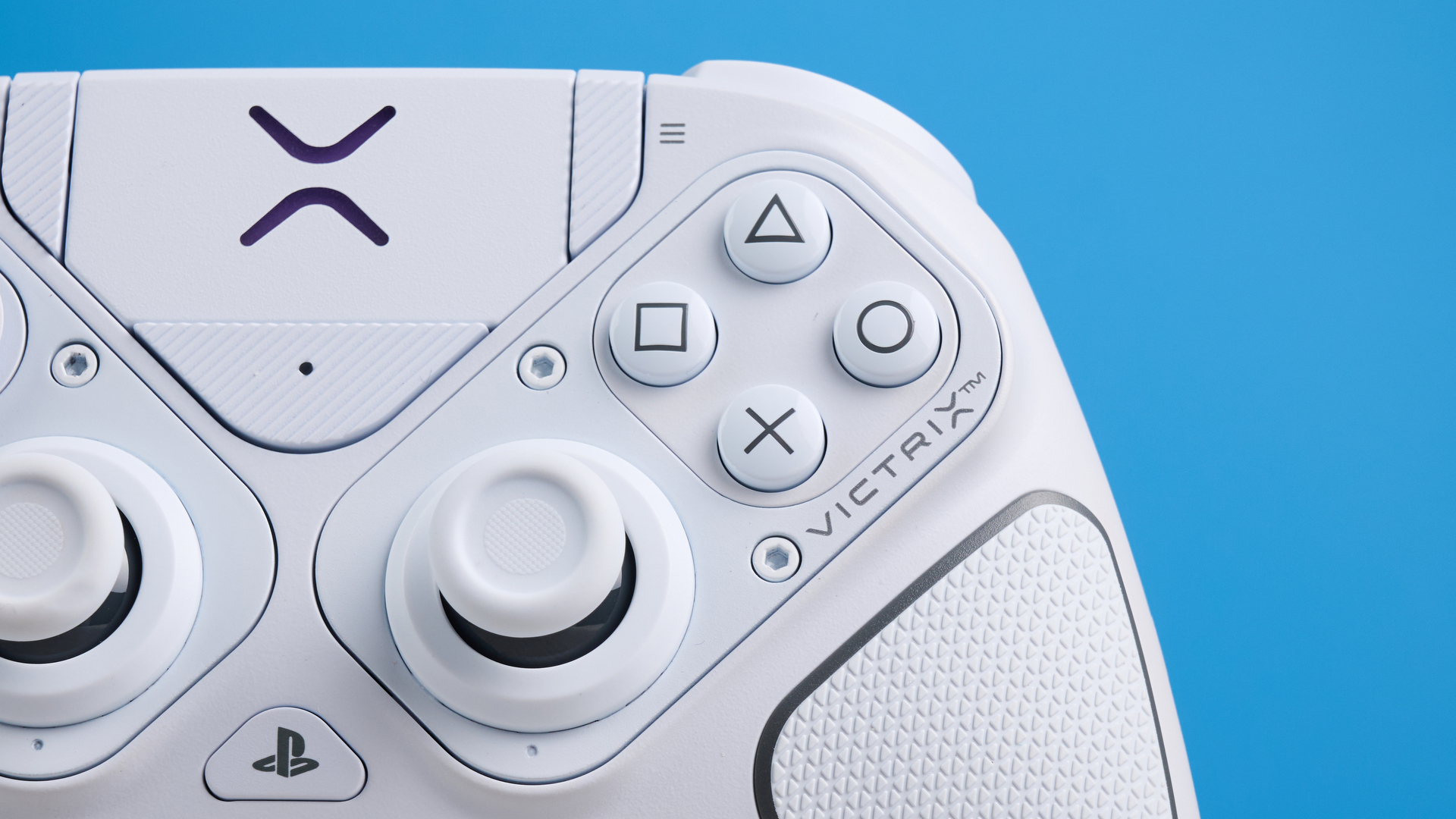 A white Turtle Beach Victrix Pro BFG Reloaded controller for the PS5