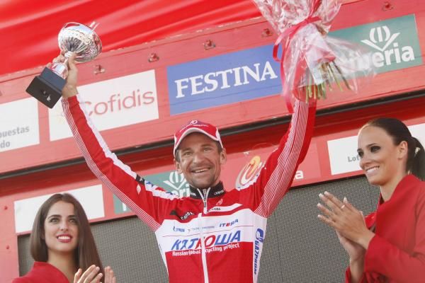 Denis Menchov (Katusha) celebrates on the podium.