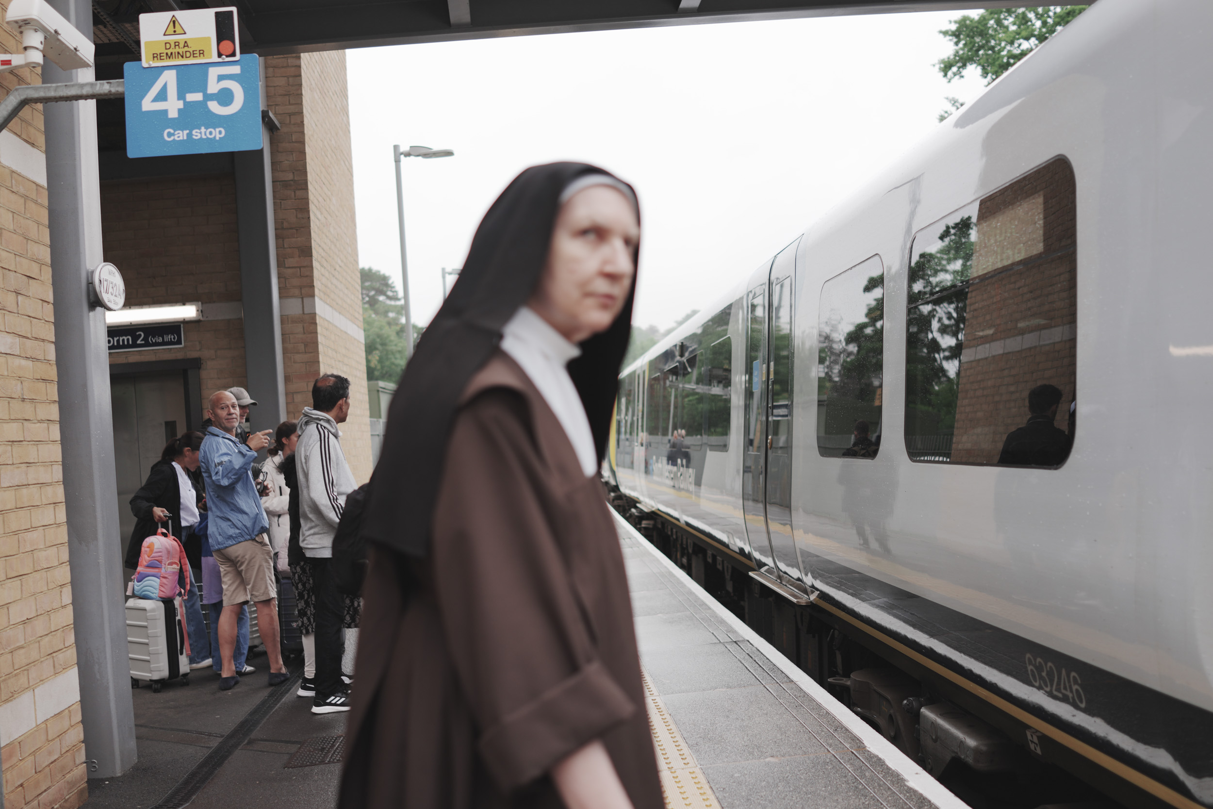 Sony RX1R III sample gallery: nun entering a train