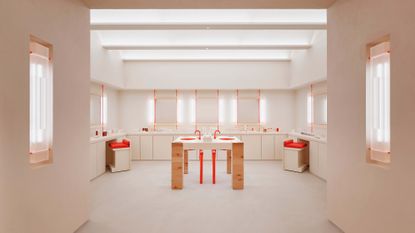 Glossier store New York interior, in nude and blush tones with red accents