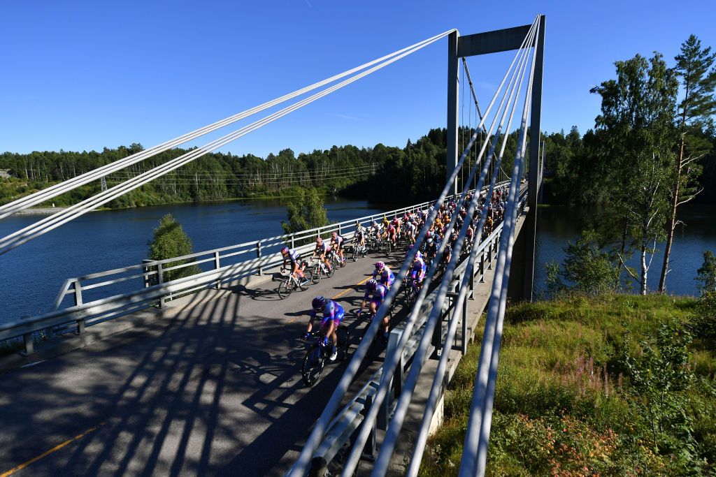 MYSEN NORWAY AUGUST 12 A general view of the peloton passing through a bridge during the 8th Tour of Scandinavia 2022 Battle Of The North Stage 4 a 1192km stage from Askim to Mysen UCIWWT tourofscandinavia TOSC22 on August 12 2022 in Mysen Norway Photo by Luc ClaessenGetty Images