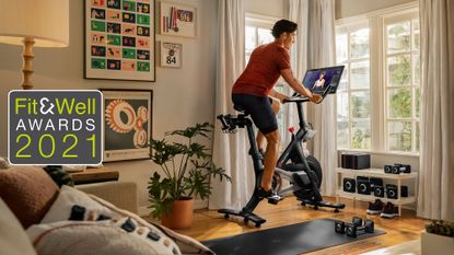 Man riding a Peloton bike, one of the winners in the Home Workout Heroes category at the Fit&Well Awards 2021
