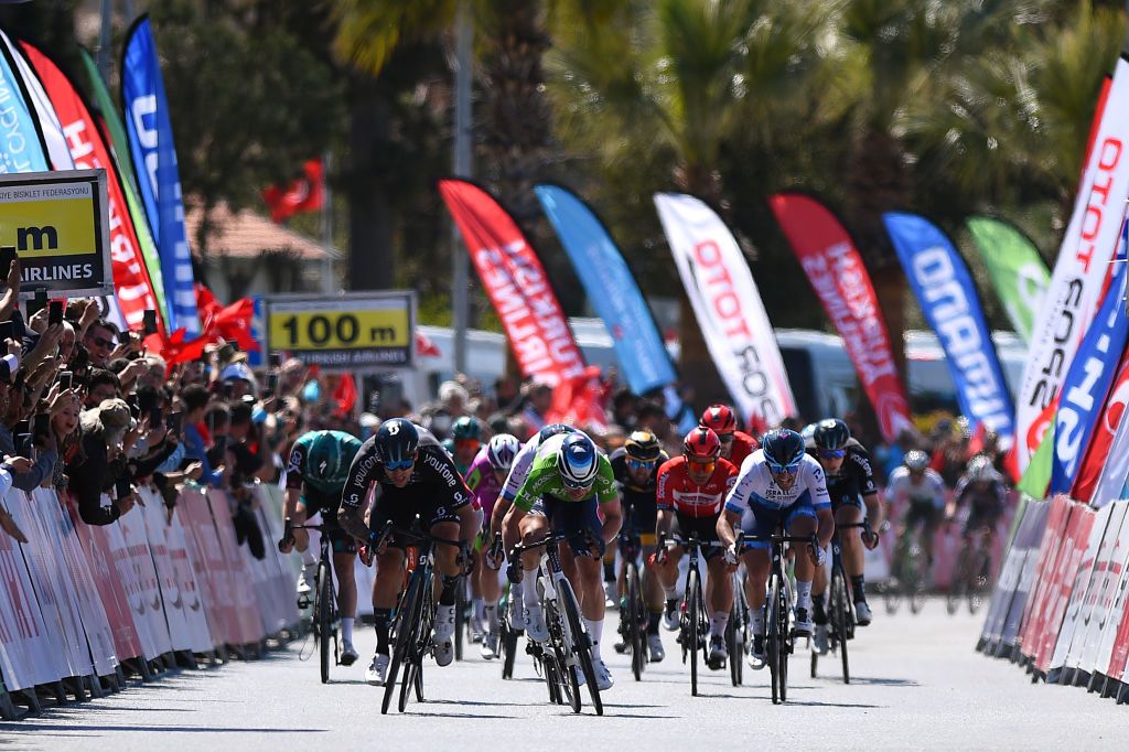 Jasper Philipsen sprints to the line but Welsford is about to pass him