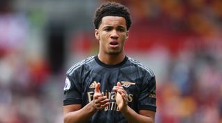 Ethan Nwaneri of Arsenal applauds the fans following the Premier League match between Brentford and Arsenal at the Gtech Community Stadium on September 18, 2022 in Brentford, England.