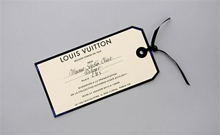 A luggage tag for Louis Vuitton’s menswear invitation