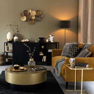 velvet yellow sofa in living room by maison du monde