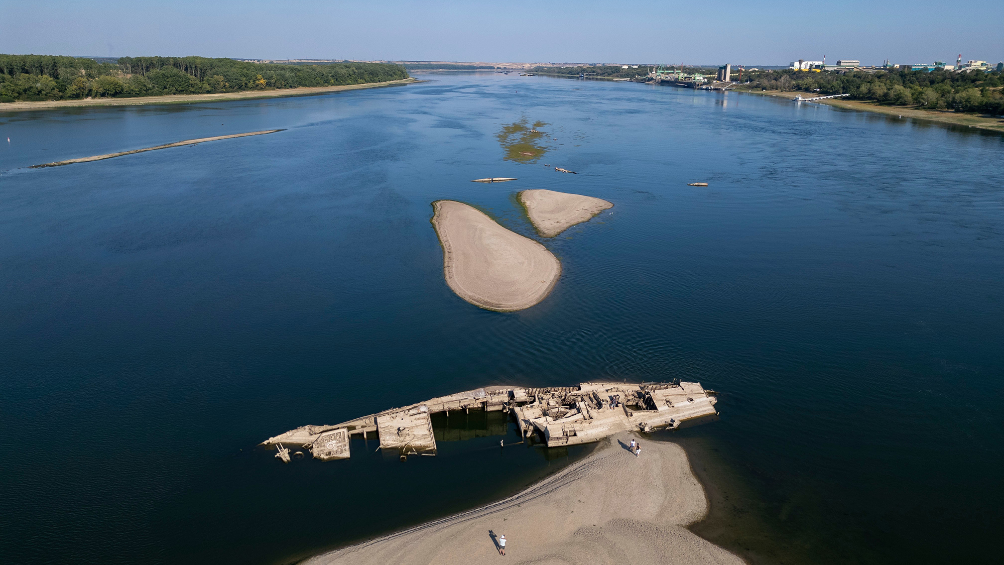 The wreckage of a WWII-era German warship is revealed as water levels continue to fall in the Danube River near Prahovo, Serbia