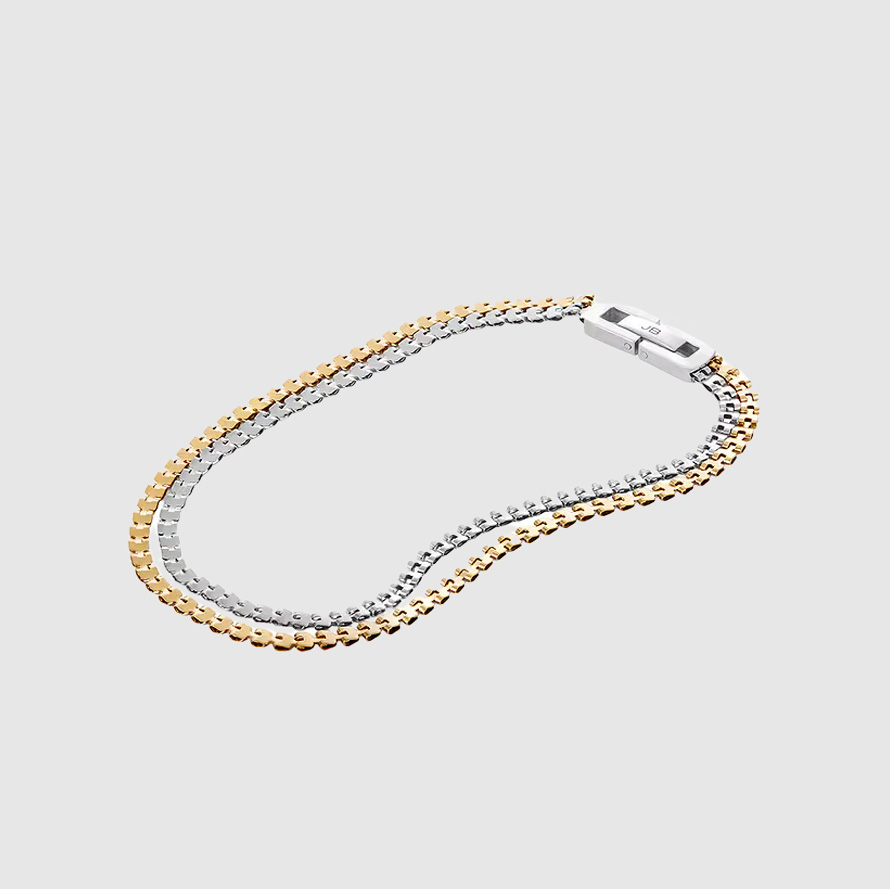 Silver-and-gold double chain-link anklet.