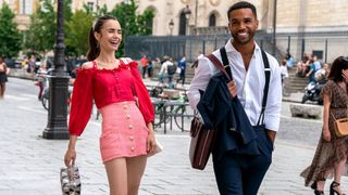 Emily in Paris laughing while walking in fashionable clothes