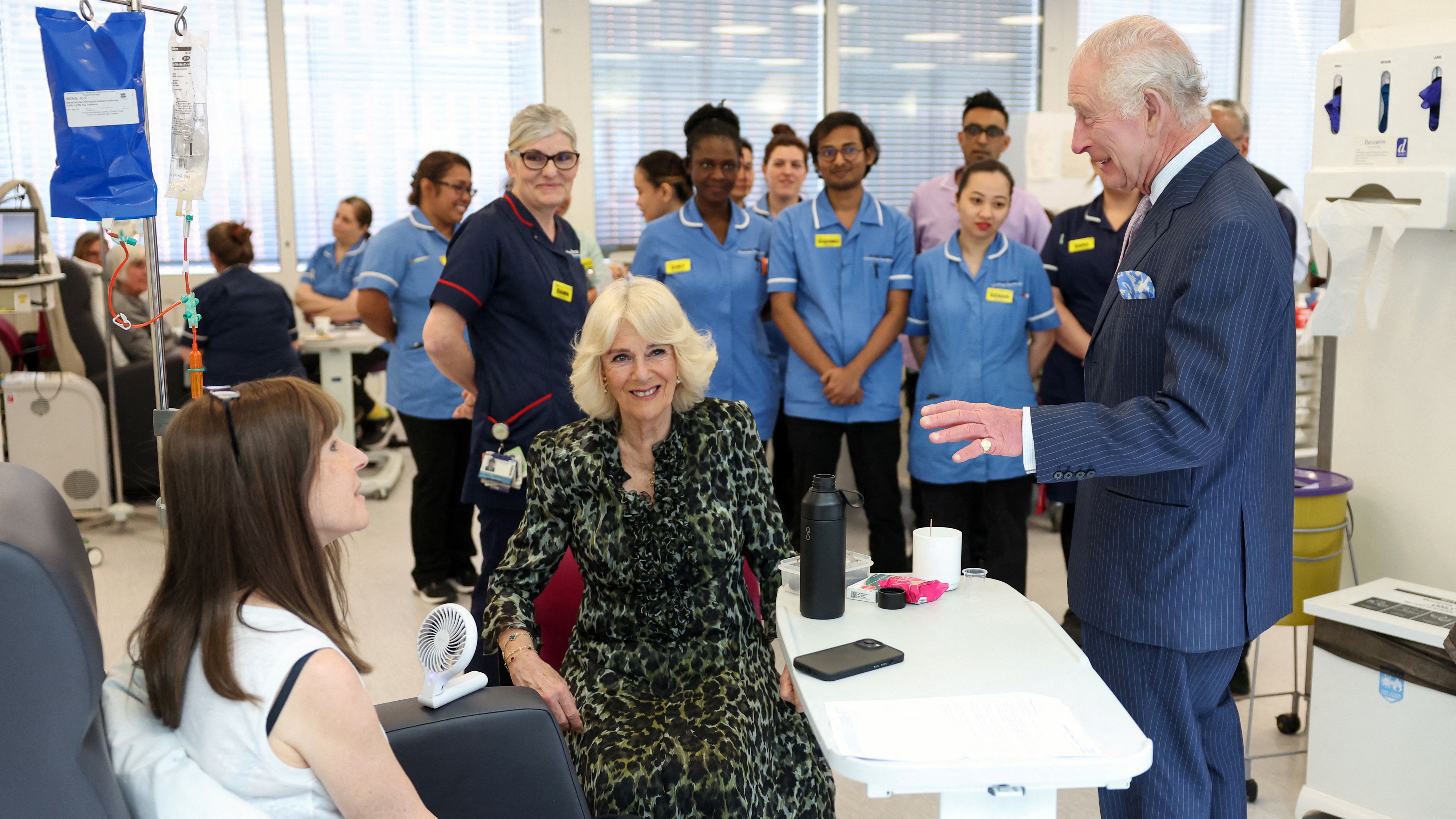 King Charles III and Queen Camilla meet patients during a visit to the University College Hospital Macmillan Cancer Centre in London on April 30, 2024