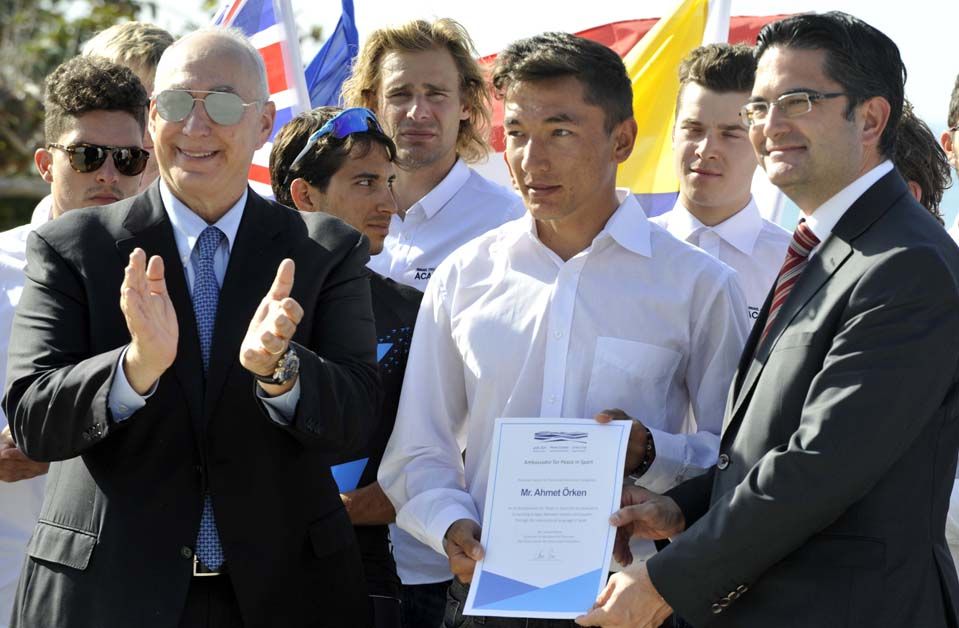 Turkish rider Ahmet Orken was awarded a certificate naming him an 'Ambassador for Peace in Sport' along with his teammates