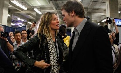 Tom Brady chats with wife Gisele Bundchen after losing to the New York Giants in Sunday's Super Bowl: The supermodel was caught on video criticizing Brady's teammates for dropping passes.