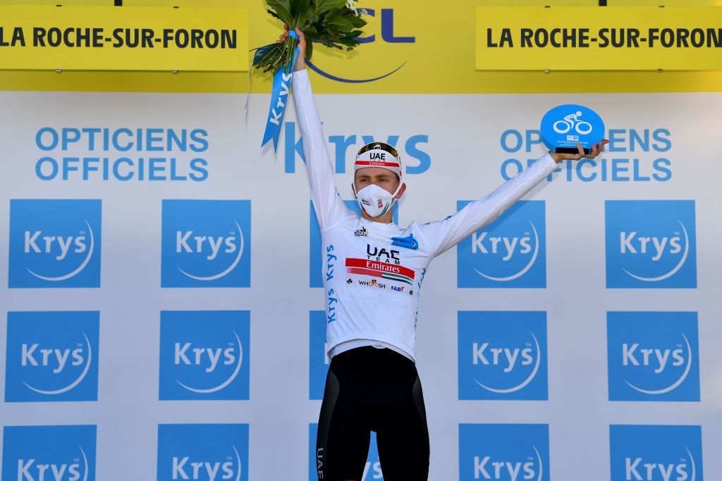 Team UAE Emirates rider Slovenias Tadej Pogacar celebrates his white jersey of best young on the podium at the end of the 18th stage of the 107th edition of the Tour de France cycling race 168 km between Meribel and La Roche sur Foron on September 17 2020 Photo by Stuart Franklin various sources AFP Photo by STUART FRANKLINAFP via Getty Images
