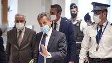 Nicolas Sarkozy arrives at court for the verdict of his trial for corruption