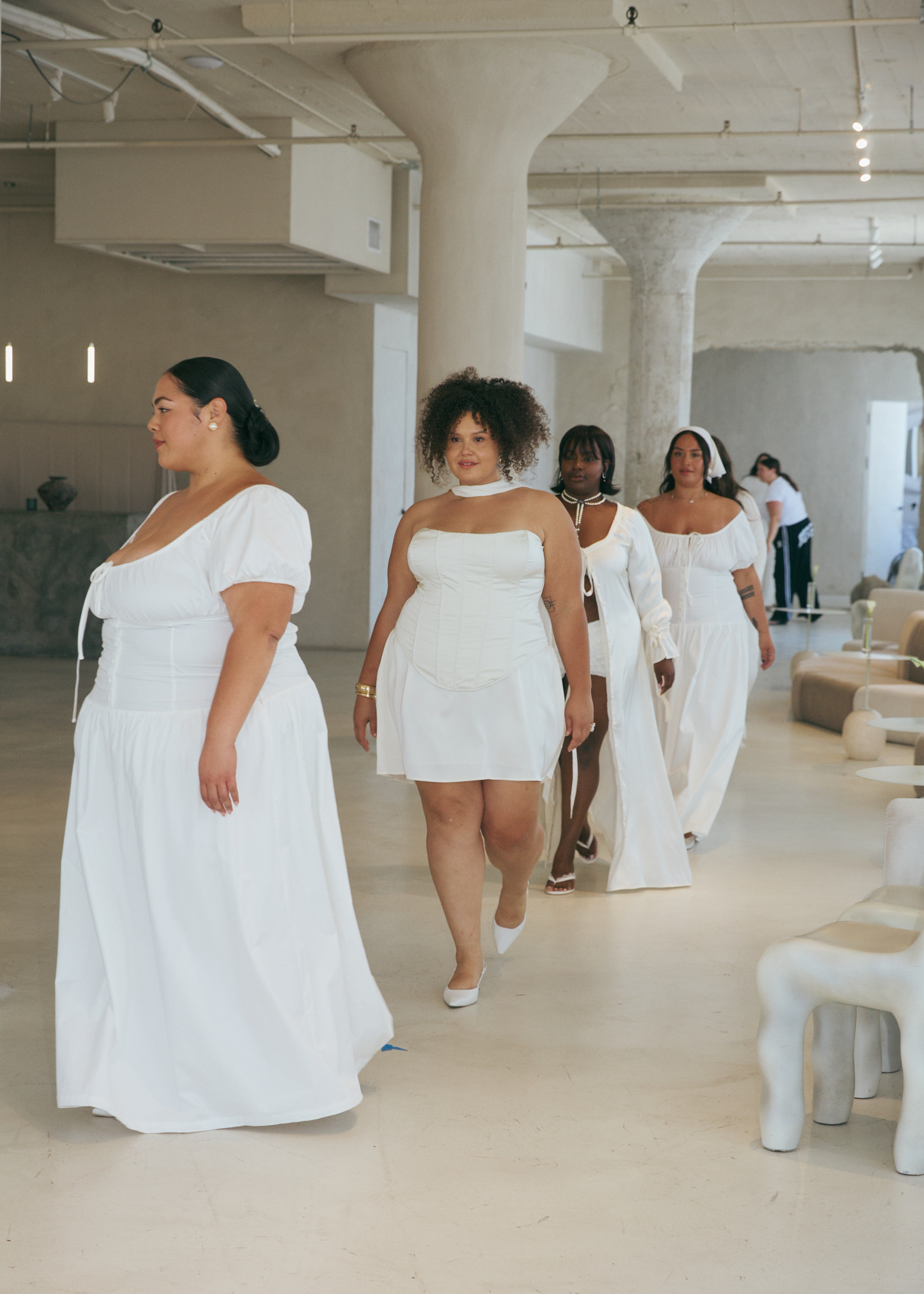 Models wear all white from Gia/IRL x Emma Arletta Bridal