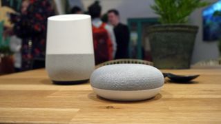 Google Home (left), Google Home Mini (right)