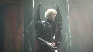 Gwendoline Christie's Lucifer stares down at Dream as he enters her palace in Hell in Netflix's The Sandman