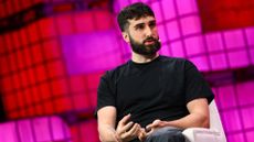 Cohere co-founder and CEO Aidan Gomez speaking on stage at Collision 2024 at the Enercare Centre in Toronto, Canada.