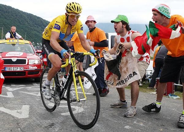 Fans cheer on Kim Kirchen (Team Columbia) as he tackles the stage's final climb.